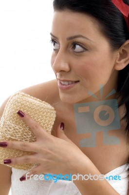 Close View Of Woman Opening The Ribbon Of Scrubber Stock Photo