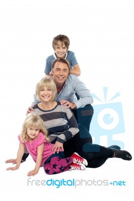 Closely Bonded Family In A Studio Stock Photo