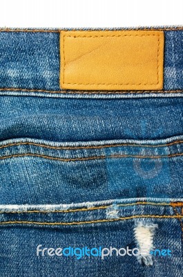 Closeup Blue Jeans With Leather Label Stock Photo