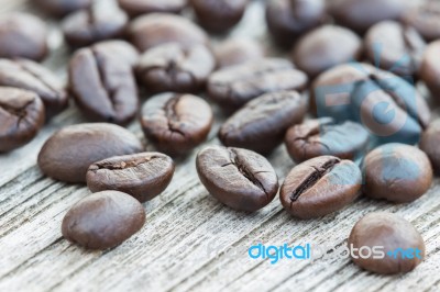 Closeup Coffee Beans On Wood Background Stock Photo