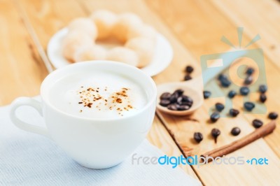 Closeup Coffee Foam And Bread Favorite Beverage In Bright Day Stock Photo