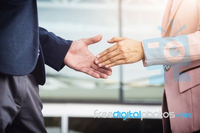 Closeup Friendly Meeting Handshake Between Business Woman And  B… Stock Photo