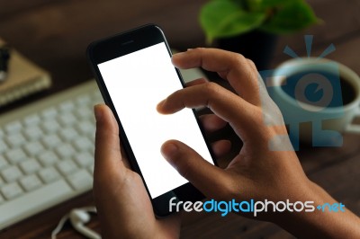 Closeup Hand Use Phone Showing White Screen On Work Desk, Blank Stock Photo