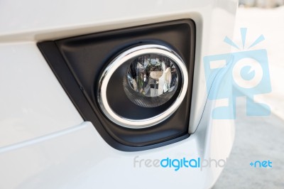 Closeup Headlights Of Modern White Car Stock Photo