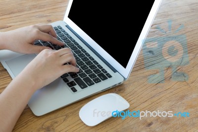 Closeup Of Business Woman Hand Typing On Laptop Keyboard Stock Photo