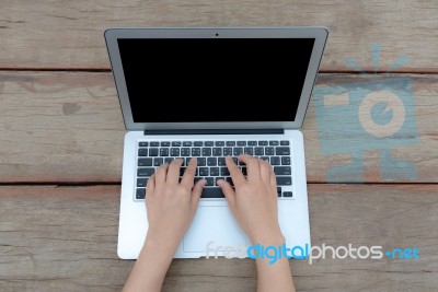 Closeup Of Business Woman Hand Typing On Laptop Keyboard Stock Photo