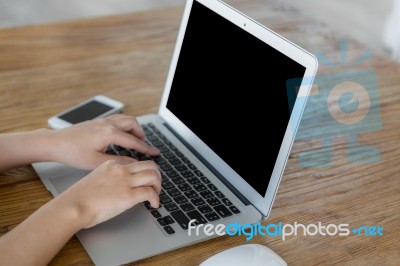 Closeup Of Business Woman Hand Typing On Laptop Keyboard Stock Photo