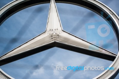 Closeup Of Mercedes Benz Logo Stock Photo