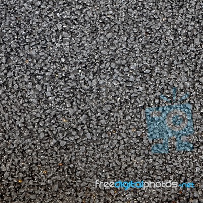 Closeup Of The Black Tar Surface Of An Asphalt Road Stock Photo