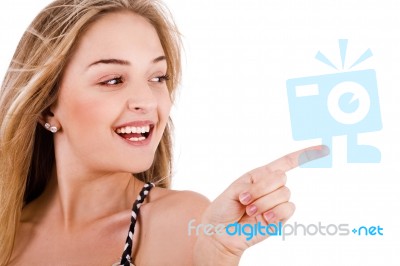 Closeup Of Young Model Pointing Empty Space Stock Photo