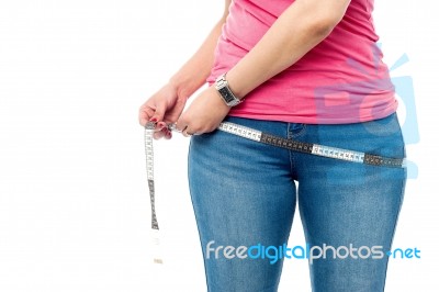 Closeup Picture Of Woman With Measure Tape Stock Photo