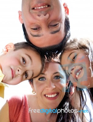 Closeup Portrait Of A Happy Family In Circle Stock Photo