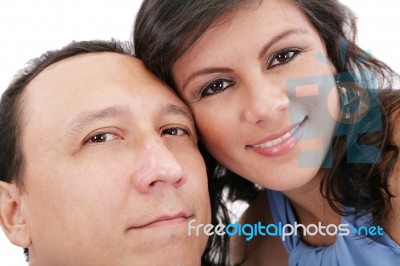 Closeup Portrait Of A Sweet Young Couple Smiling Together Stock Photo