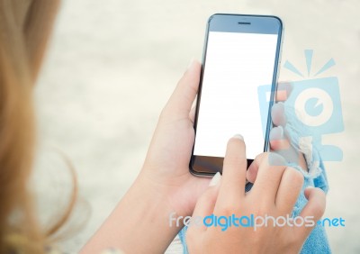 Closeup Women Using Phone From Back View Stock Photo