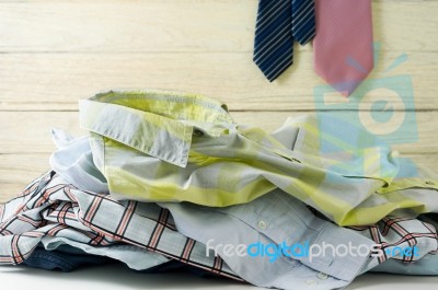 Clothes For Laundry With Wood Background Stock Photo