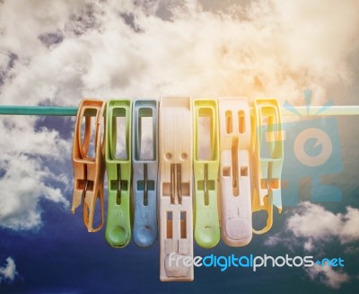 Clothespin With Blue Sky Stock Photo