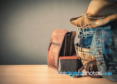 Clothing And Bags On  Wooden Stock Photo