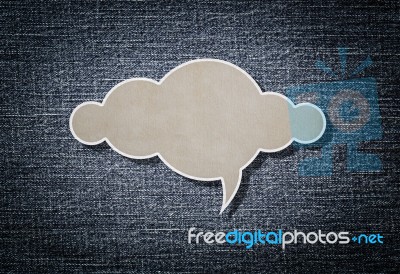 Cloud Paper On Blue Denim Background Stock Photo