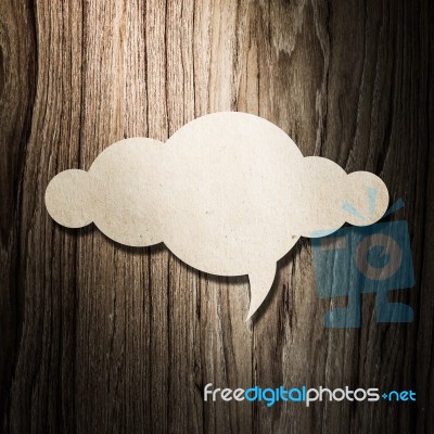 Cloud Paper On Wooden Background Stock Photo