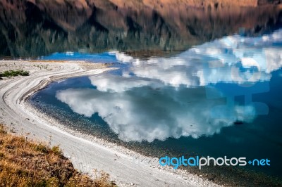 Cloud Reflected In Lake Hawea Stock Photo