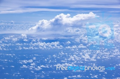 Cloud Scatter On Blue Sky Stock Photo