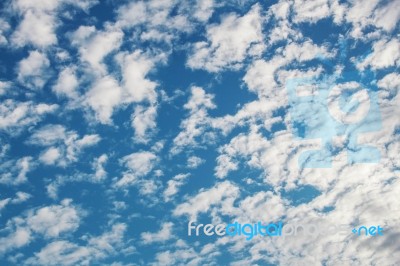 Clouds And Blue Sky Background Stock Photo