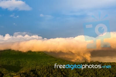 Clouds Cover The Mountain Stock Photo