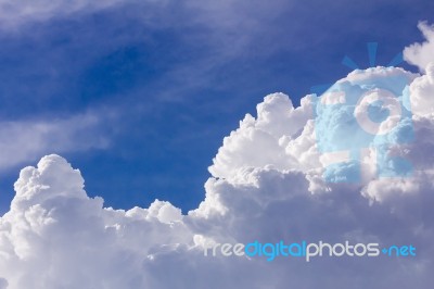 Clouds In Blue Sky Before Rain Stock Photo