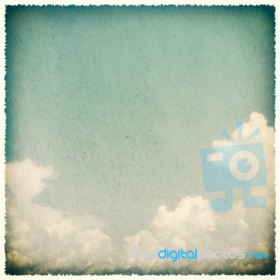 Clouds On A Textured, Vintage Paper Background Stock Photo