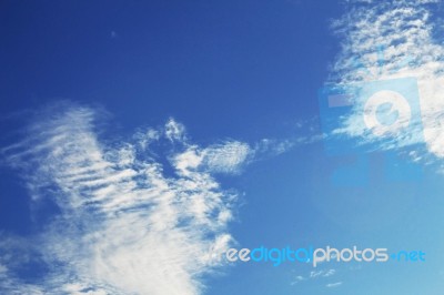 Clouds On The Blue Sky Stock Photo