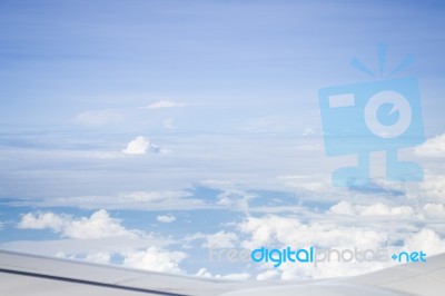 Cloudy Sky View From Airplane Cabin Window Stock Photo