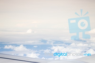 Cloudy Sky View From Airplane Cabin Window Stock Photo