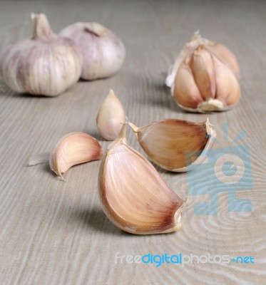 Cloves Of Garlic On The Table Stock Photo