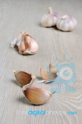 Cloves Of Garlic On The Table Stock Photo