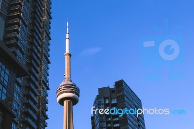 Cn Tower In Toronto Canada Surrounded By Buildings Stock Photo