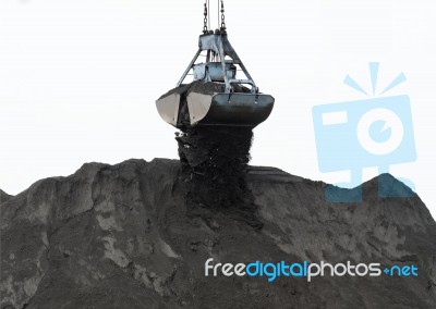 Coal Powder and clamshell bucket Stock Photo