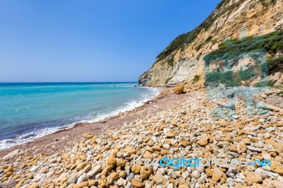 Coast Landscape With Stony Beach And Blue Sea Stock Photo