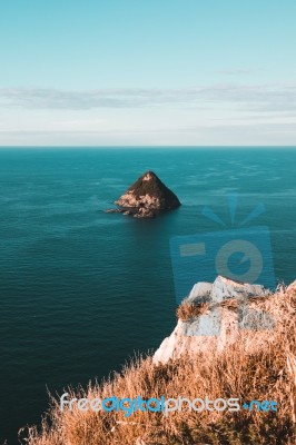 Coastal Island In Tropical Water Stock Photo