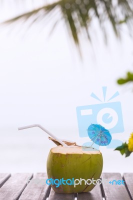 Coconut Water Drink Served In Coconut With Drinking Straw On The… Stock Photo