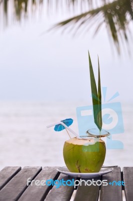 Coconut Water Drink Served In Coconut With Drinking Straw On The… Stock Photo