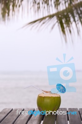 Coconut Water Drink Served In Coconut With Drinking Straw On The… Stock Photo