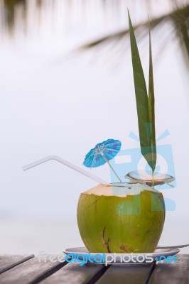 Coconut Water Drink Served In Coconut With Drinking Straw On The… Stock Photo