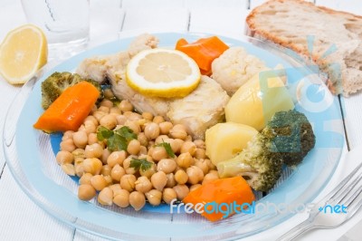 Codfish With Chickpeas And Vegetables Stock Photo