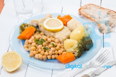 Codfish With Chickpeas And Vegetables Stock Photo