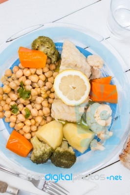 Codfish With Chickpeas And Vegetables Stock Photo