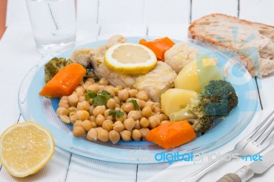 Codfish With Chickpeas And Vegetables Stock Photo