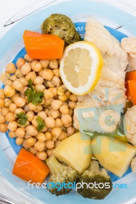 Codfish With Chickpeas And Vegetables Stock Photo