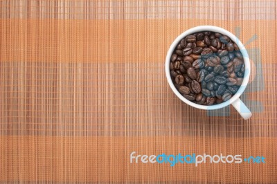 Coffe Bean In Cup Stock Photo