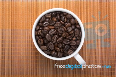 Coffe Bean In Cup Stock Photo