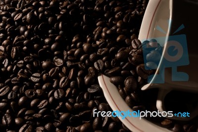 Coffe Beans And Cup Stock Photo